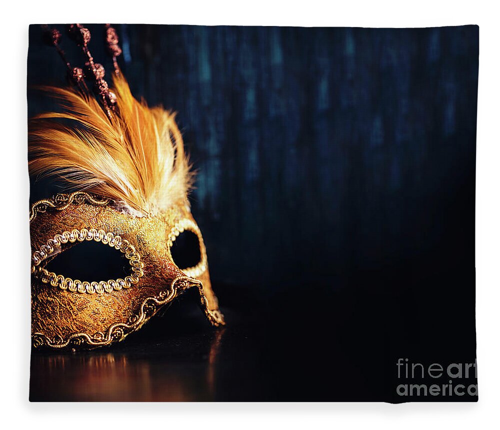 Mask Fleece Blanket featuring the photograph Golden Venetian mask on dark blue background by Jelena Jovanovic
