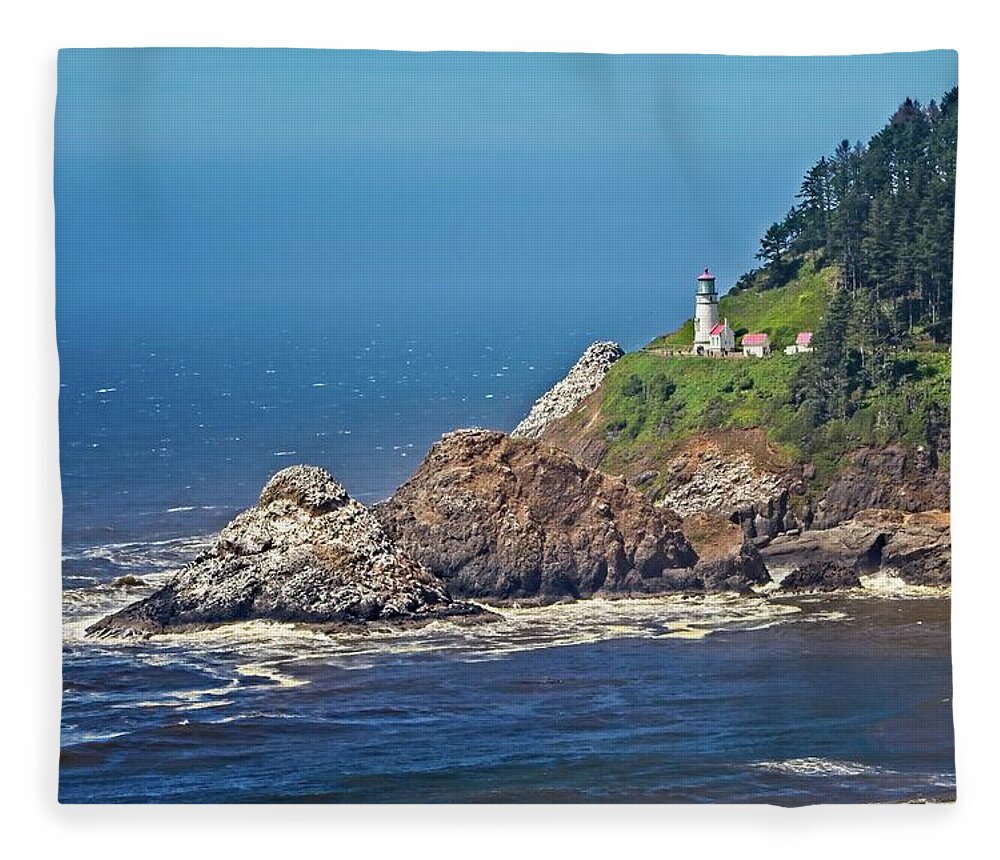 Promontory Fleece Blanket featuring the photograph Haceta Head Lighthouse by Loren Gilbert