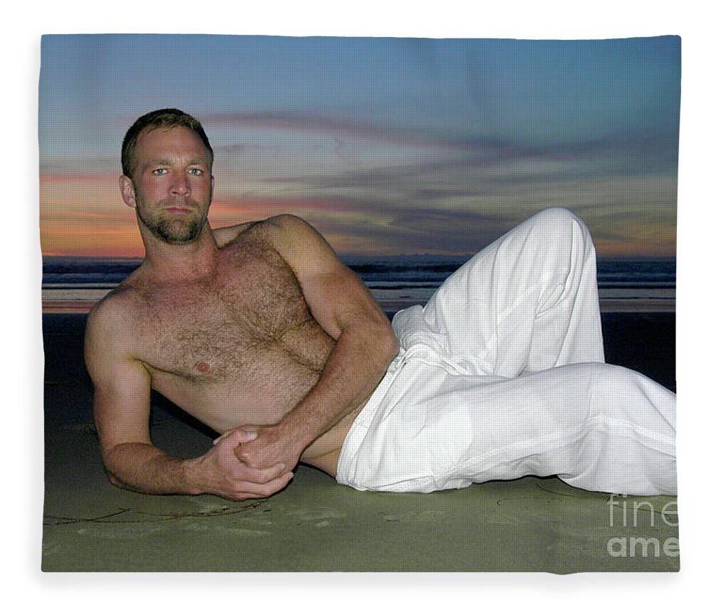 Handsome and sexy this hairy hunk lies on the beach at sunset. Fleece  Blanket by Gunther Allen - Pixels