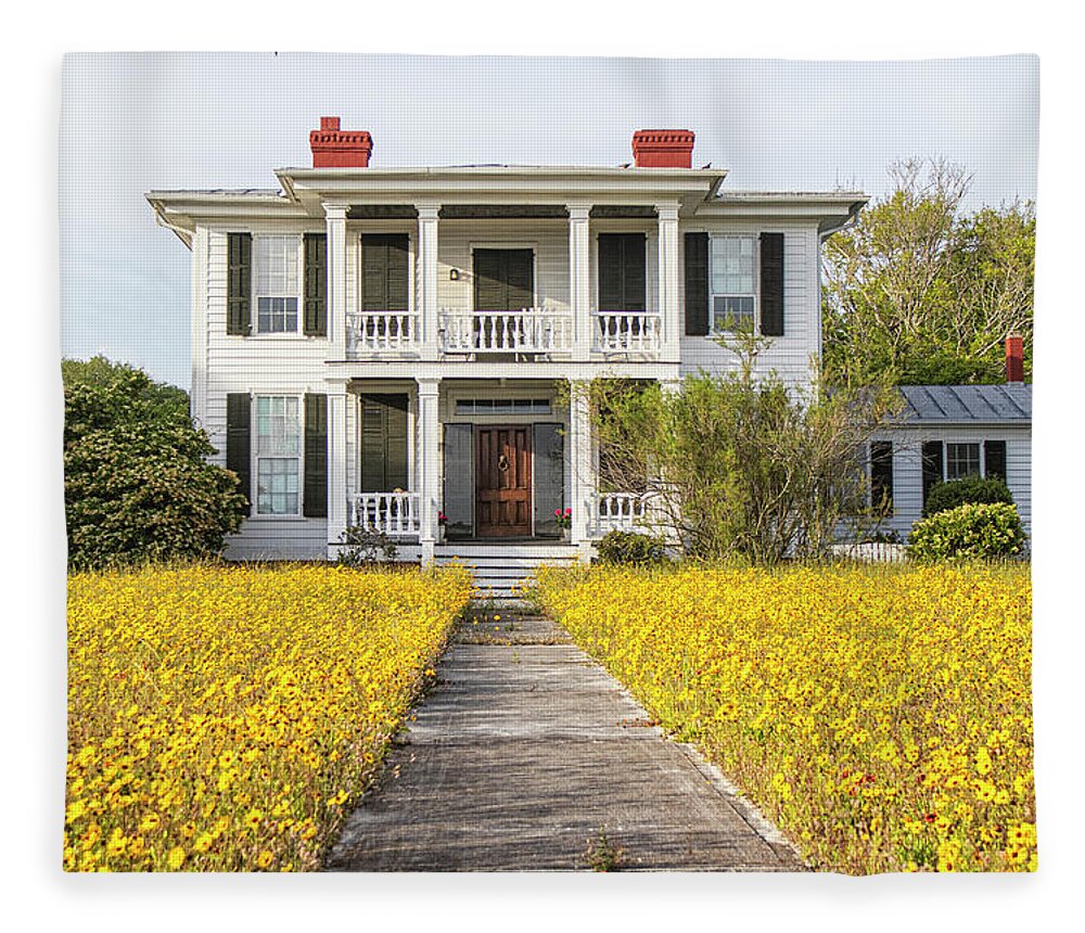 Beaufort Fleece Blanket featuring the photograph HIstoric Home With Yard of Wildflowers - Beaufort North Carolina by Bob Decker