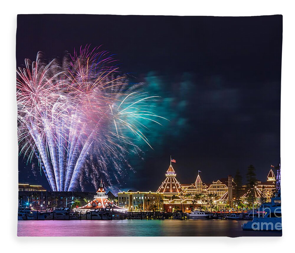 Festival Fleece Blanket featuring the photograph Holiday fireworks show at the historic Hotel del Coronado by Sam Antonio