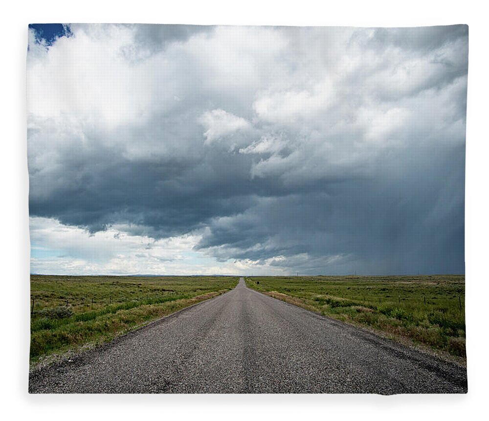 Storm Fleece Blanket featuring the photograph Idaho Stormy Road by Wesley Aston