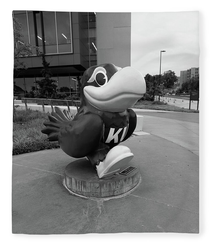 Kansas Jayhawks Fleece Blanket featuring the photograph Kansas Jayhawks statue in black and white by Eldon McGraw