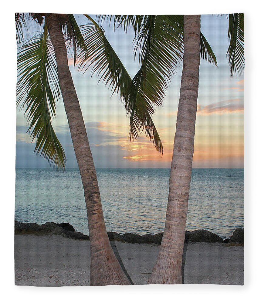 Key West; Florida; Sunset; Palm Trees; Trees; Beach; Sand; Ocean; Sea; Clouds; Water; Waves; Palm Fronds; Vertical; Wood; Fleece Blanket featuring the photograph Key West Sunset by Tina Uihlein