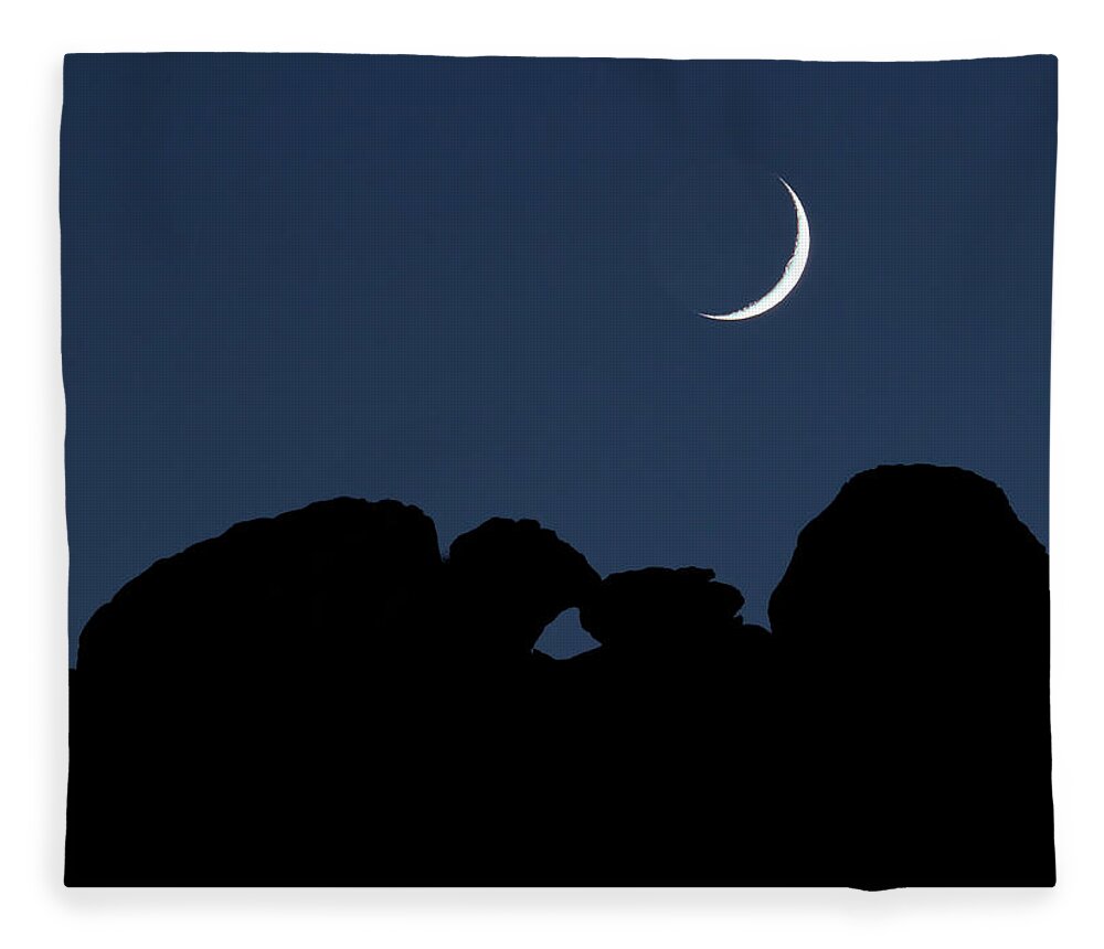 Moon Fleece Blanket featuring the photograph Kissing Camels Moonset by Bob Falcone