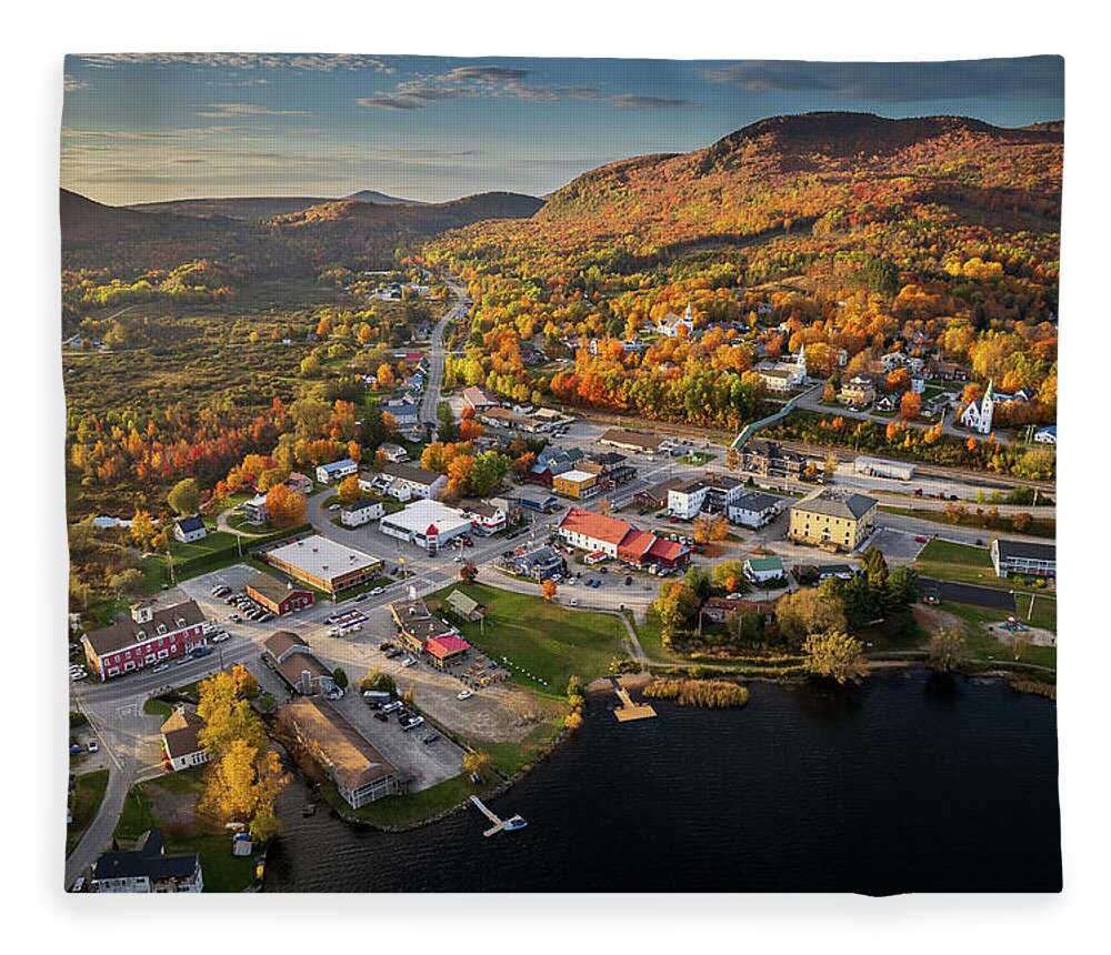  Fleece Blanket featuring the photograph Late Day Sunlight Shines On Island Pond, Vermont by John Rowe