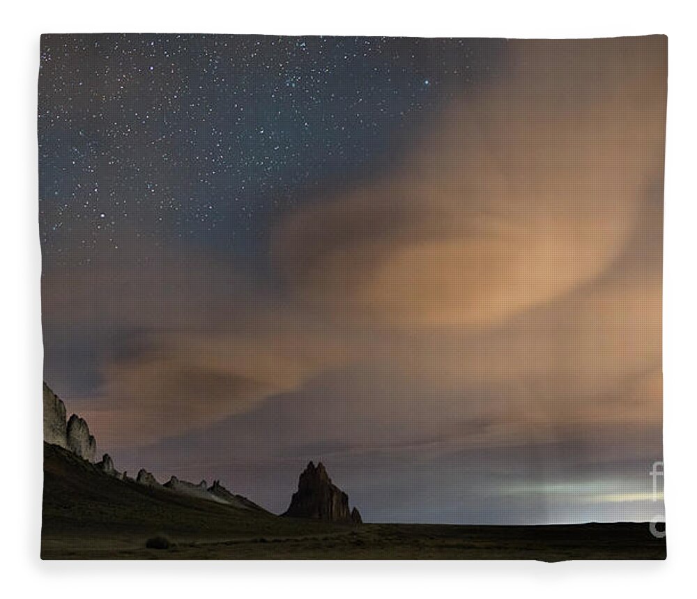 Shiprock Fleece Blanket featuring the photograph Lenticular clouds at Shiprock by Keith Kapple