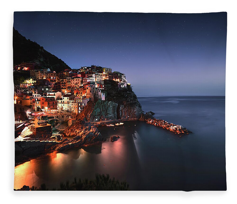 Manarola Fleece Blanket featuring the photograph Night in Manarola by Stefano Orazzini
