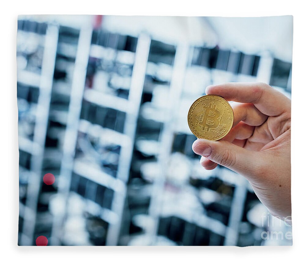 Bitcoin Fleece Blanket featuring the photograph Man's hand showing bitcoin coin by Michal Bednarek