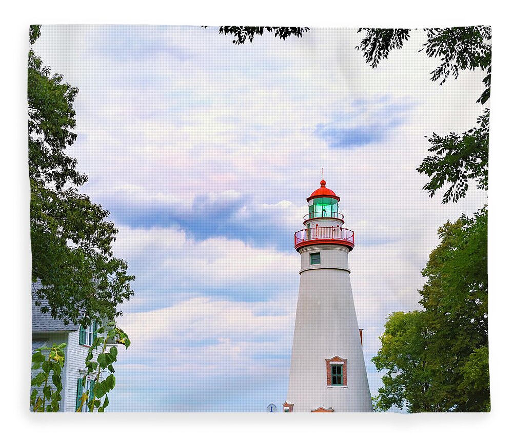Lake Erie Lighthouse Fleece Blanket featuring the photograph Marblehead Lighthouse Framed by Trees 1 by Marianne Campolongo