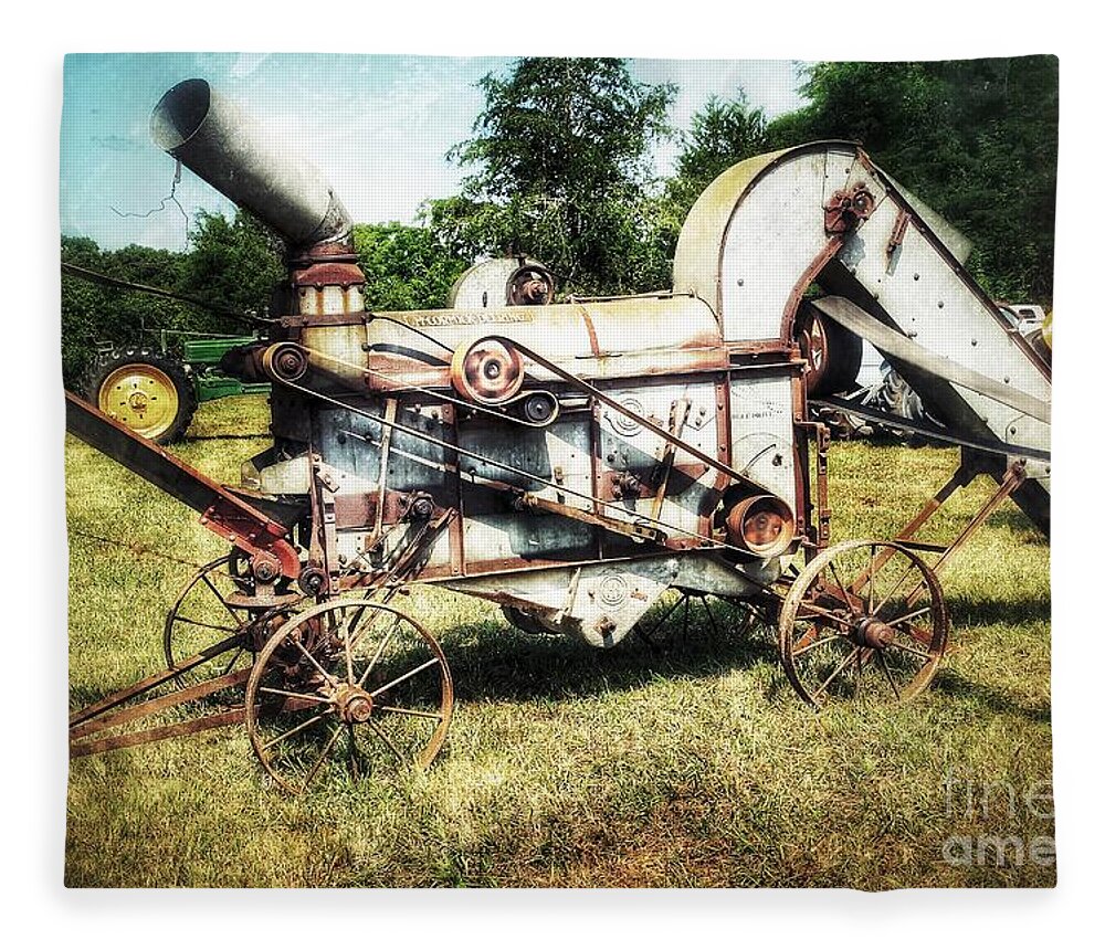 Farm Fleece Blanket featuring the photograph McCormick Deering by Mike Eingle