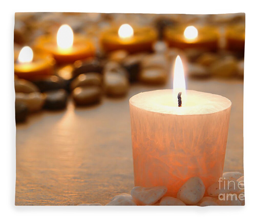 Burn Fleece Blanket featuring the photograph Meditation Candle Burning in Temple by Olivier Le Queinec