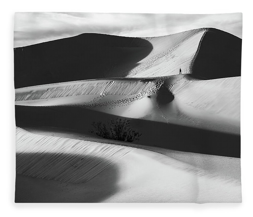American Landscape Fleece Blanket featuring the photograph Lone Hiker on Dunes bw by Jonathan Nguyen