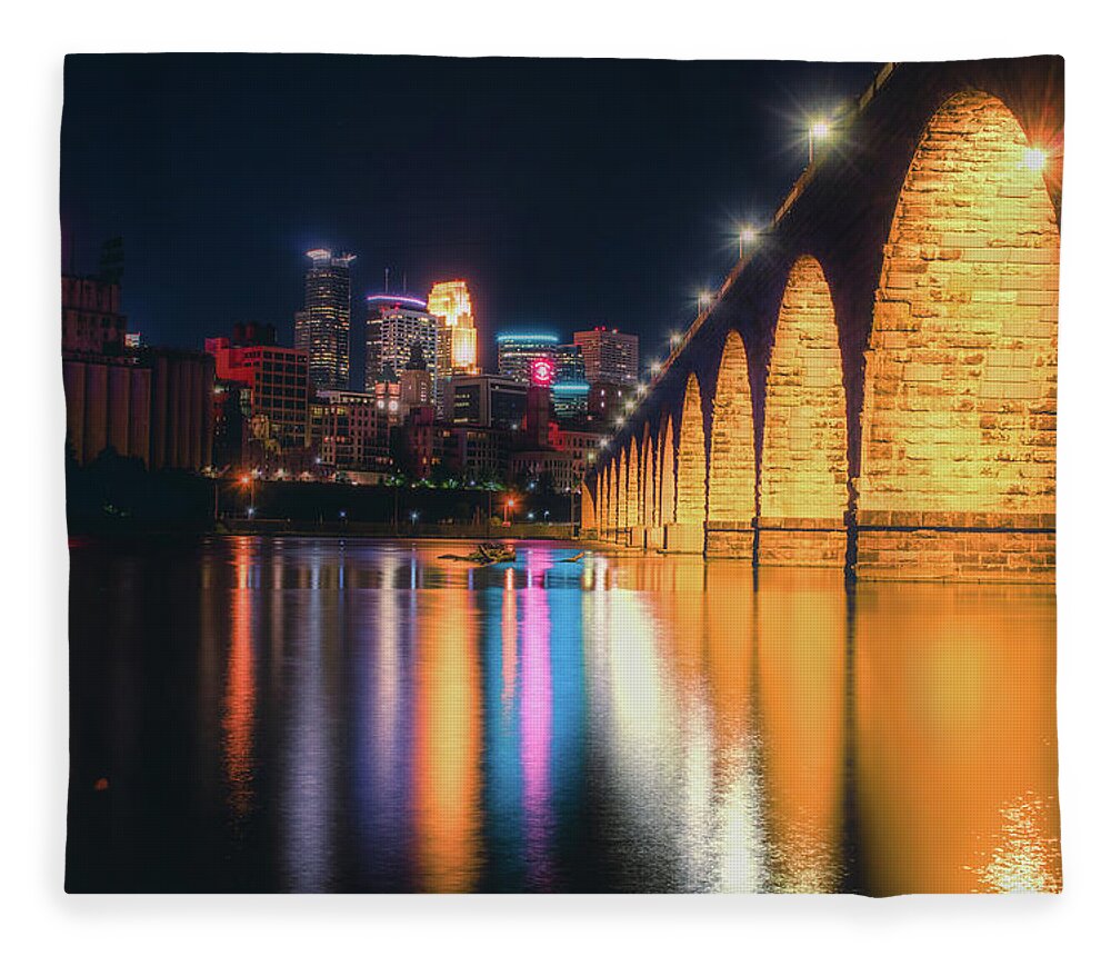 Minneapolis Fleece Blanket featuring the photograph Minneapolis and the Stone Arch Bridge by Jay Smith
