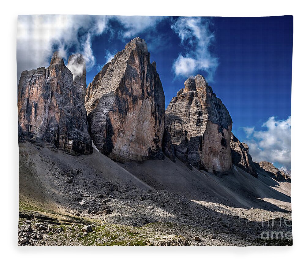 Alpine Fleece Blanket featuring the photograph Mountain Formation Tre Cime Di Lavaredo In The Dolomites Of South Tirol In Italy by Andreas Berthold