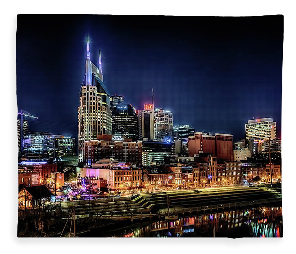 Nashville Skyline Fleece Blanket featuring the photograph Music City at Night by Susan Rissi Tregoning