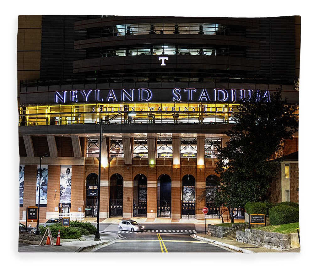 University Of Tennessee At Night Fleece Blanket featuring the photograph Neyland Stadium at the University of Tennessee at night by Eldon McGraw