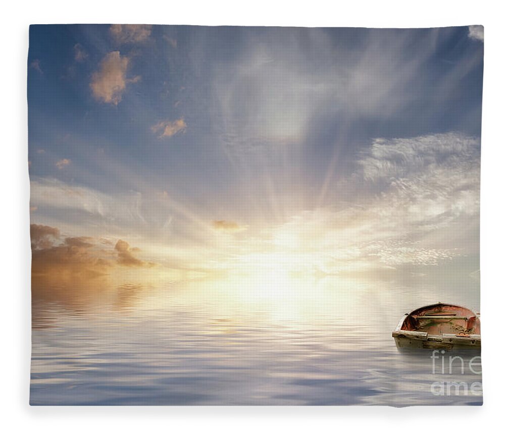 Ocean Fleece Blanket featuring the photograph Old Rowing Boat Adrift At Sea by Simon Bratt