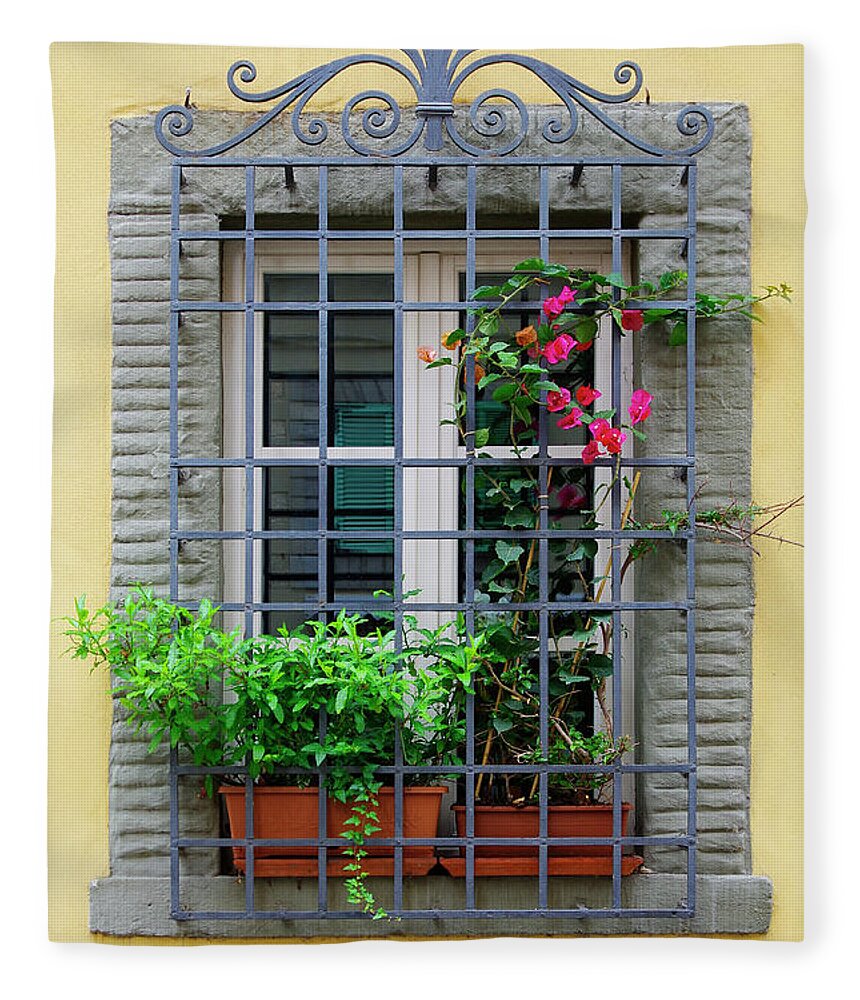 Lucca Fleece Blanket featuring the photograph Picture Window - Window bars and flower pots on tis yellow wall in Lucca Italy by Kenneth Lane Smith