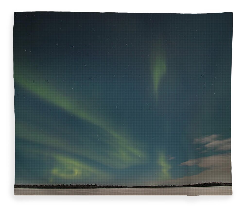 Aurora Borealis Fleece Blanket featuring the photograph Polar green lines on the dark sky. Northern lights by Vaclav Sonnek