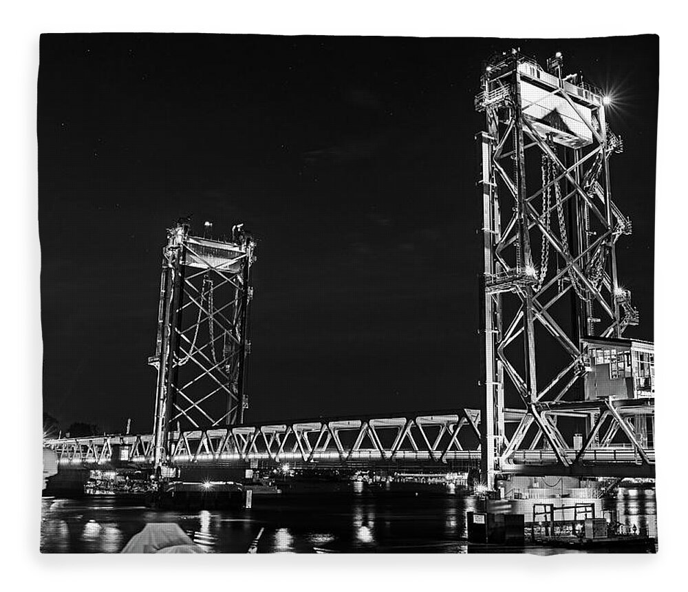 Portsmouth Fleece Blanket featuring the photograph Portsmouth New Hampshire New Castle Street Bridge Lit up at Night Route 1B Piscataqua River BW by Toby McGuire