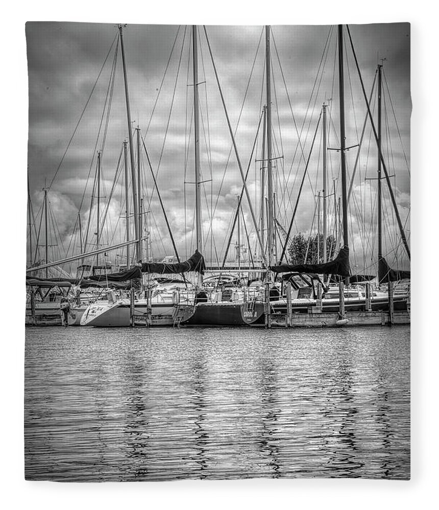 Boats Fleece Blanket featuring the photograph Reflections and Boats at the Harbor in Black and White by Debra and Dave Vanderlaan