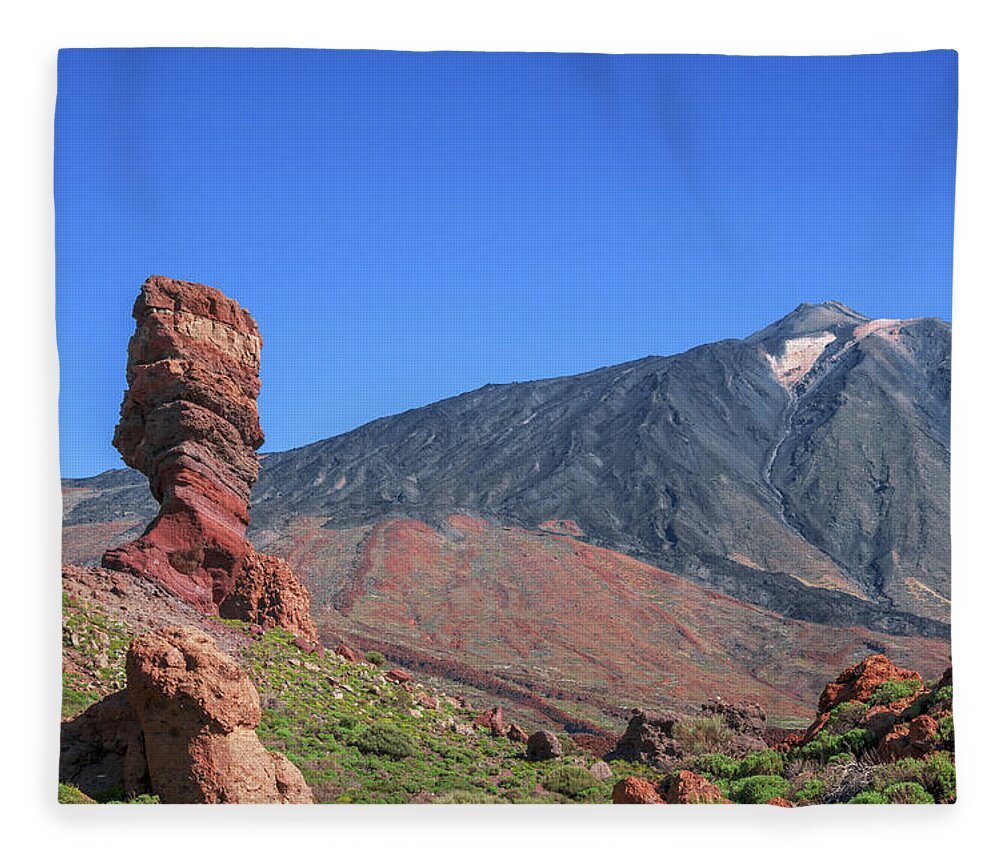 Mountains Fleece Blanket featuring the photograph Roque Cinchado in front of Mount Teide by Sun Travels