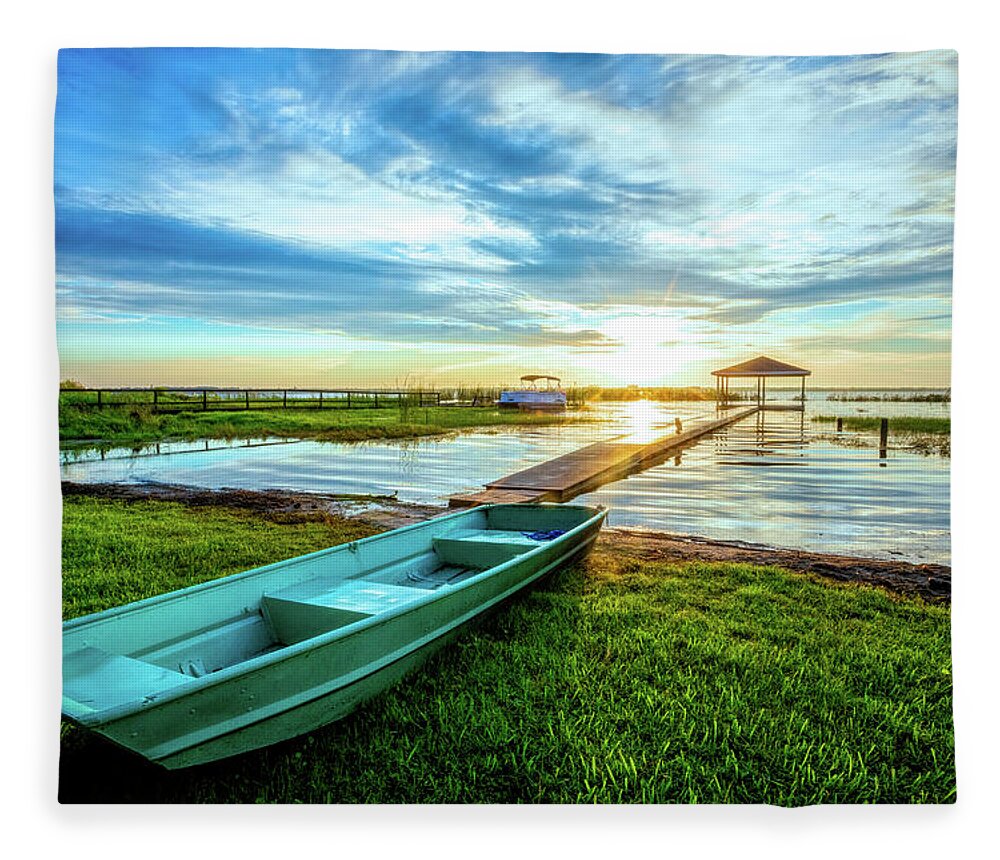 Docks Fleece Blanket featuring the photograph Rowboat at the Water's Edge by Debra and Dave Vanderlaan