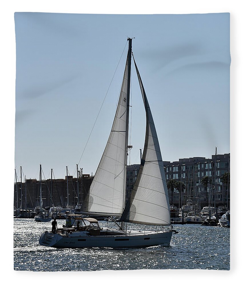 Yacht Fleece Blanket featuring the photograph Sailboat in a beautiful marina by Mark Stout