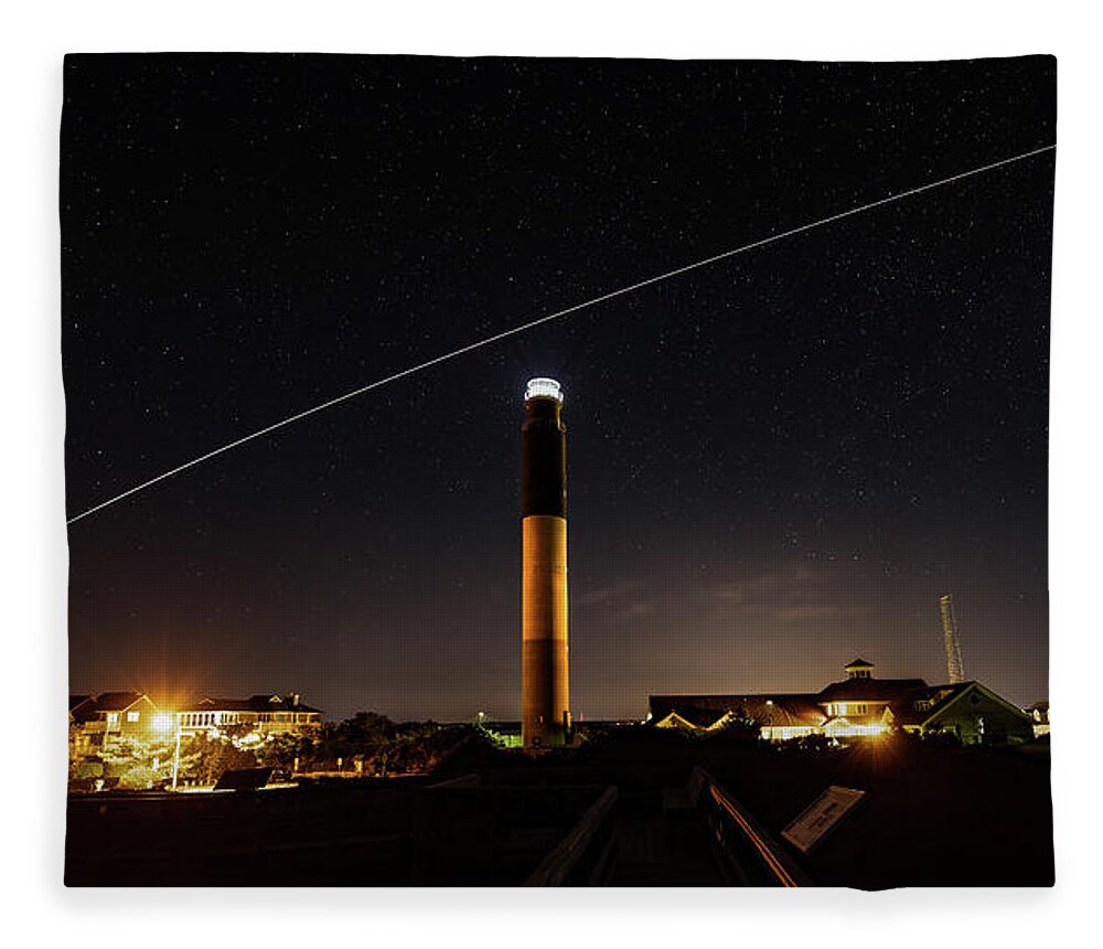 Caswell Beach Fleece Blanket featuring the photograph Space Station at the Lighthouse by Nick Noble