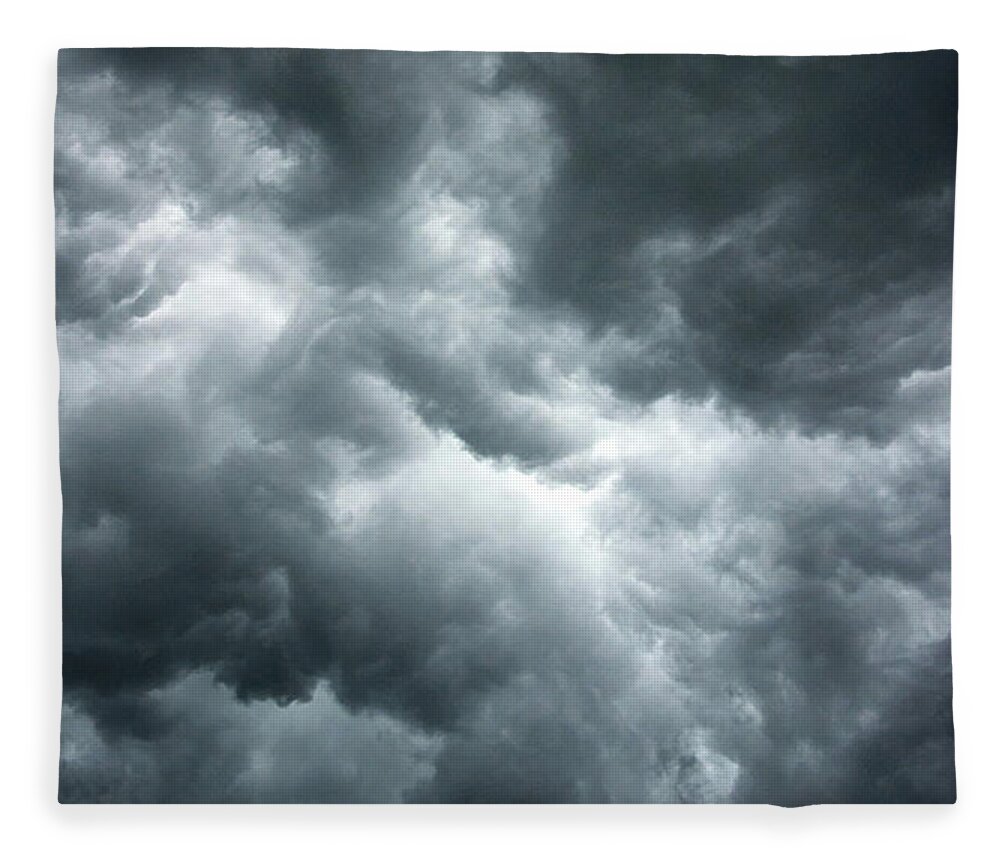 Clouds Fleece Blanket featuring the photograph Stormy clouds in the sky. by Bernhard Schaffer