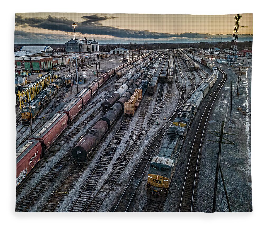 Railroad Fleece Blanket featuring the photograph Sunset arrival of Northbound CSX Q512-01 at Howell Yard Evansville IN by Jim Pearson