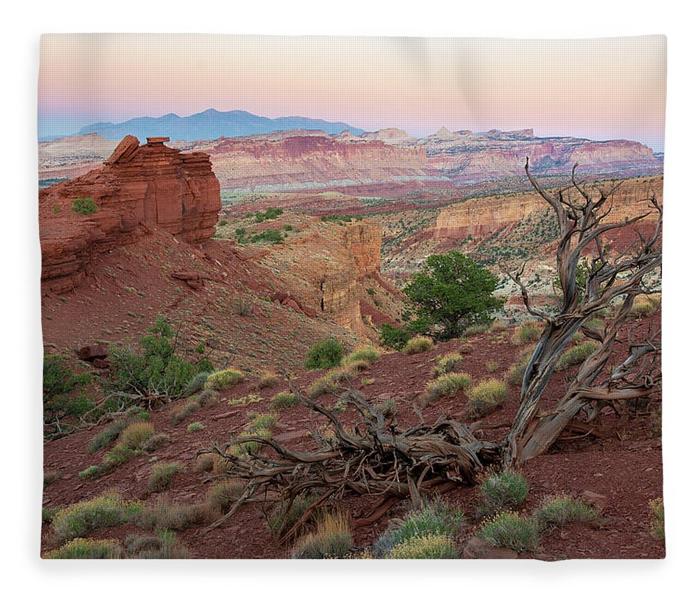 Utah Fleece Blanket featuring the photograph Sunset on Capitol Reef by Aaron Spong