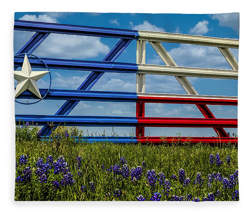 Texas Fleece Blanket featuring the photograph Texas Flag Painted Gate with Blue Bonnets by Robert Bellomy