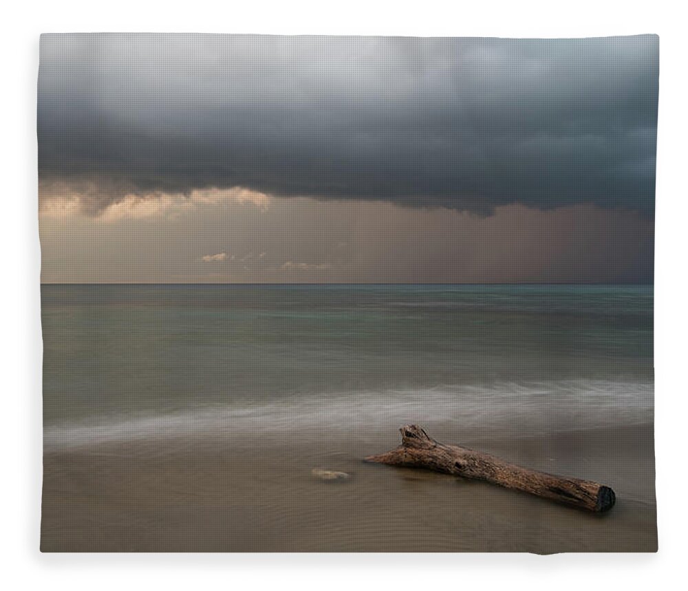 Storm Fleece Blanket featuring the photograph The coming of the storm from ocean by Michalakis Ppalis