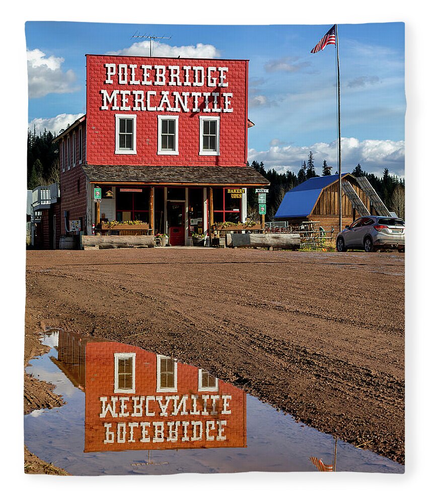 Polebridge Fleece Blanket featuring the photograph The Merc by Jack Bell