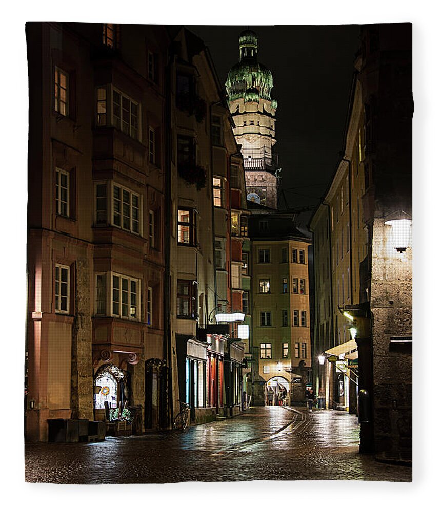Austria Fleece Blanket featuring the photograph The old town in Innsbruck, Austria. by Bernhard Schaffer