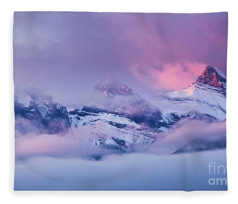 Rocky Mountains Fleece Blanket featuring the photograph The Three Sisters peaks at Sunrise, Canmore, Alberta, Canada by Neale And Judith Clark