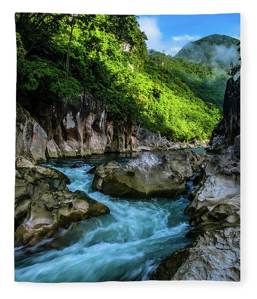 Rizal Fleece Blanket featuring the photograph Tinipak River in Tanay by Arj Munoz