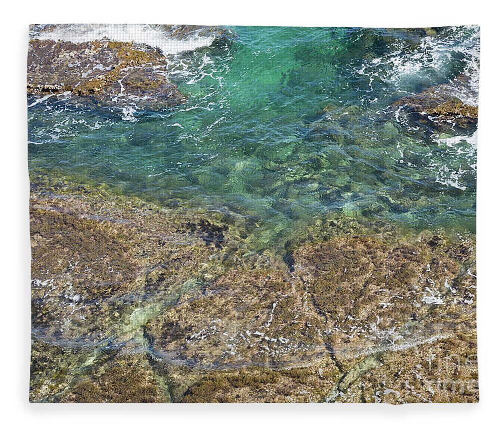 Turquoise Fleece Blanket featuring the photograph Turquoise Blue Water And Rocks On The Coast by Adriana Mueller