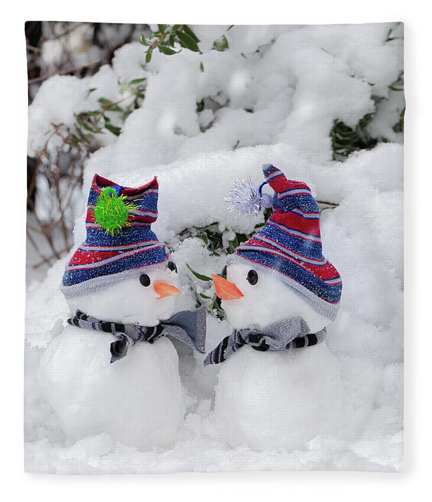 Snowman Fleece Blanket featuring the photograph Two cute little snowmen dressed for snow by Simon Bratt