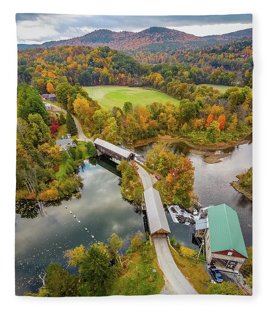 Hartland Vermont Fleece Blanket featuring the photograph Vertical Vermont autumn colors over the Willard Twin Bridges by Jeff Folger
