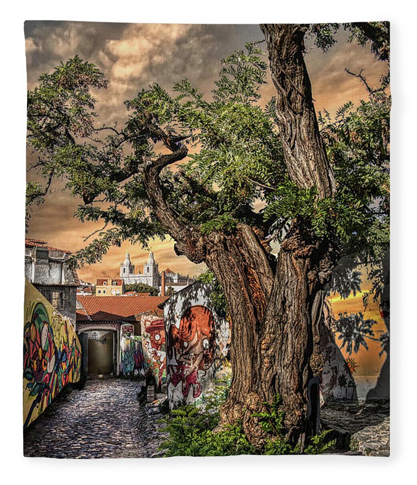 Lisbon Fleece Blanket featuring the photograph Walking in history's footsteps by Micah Offman