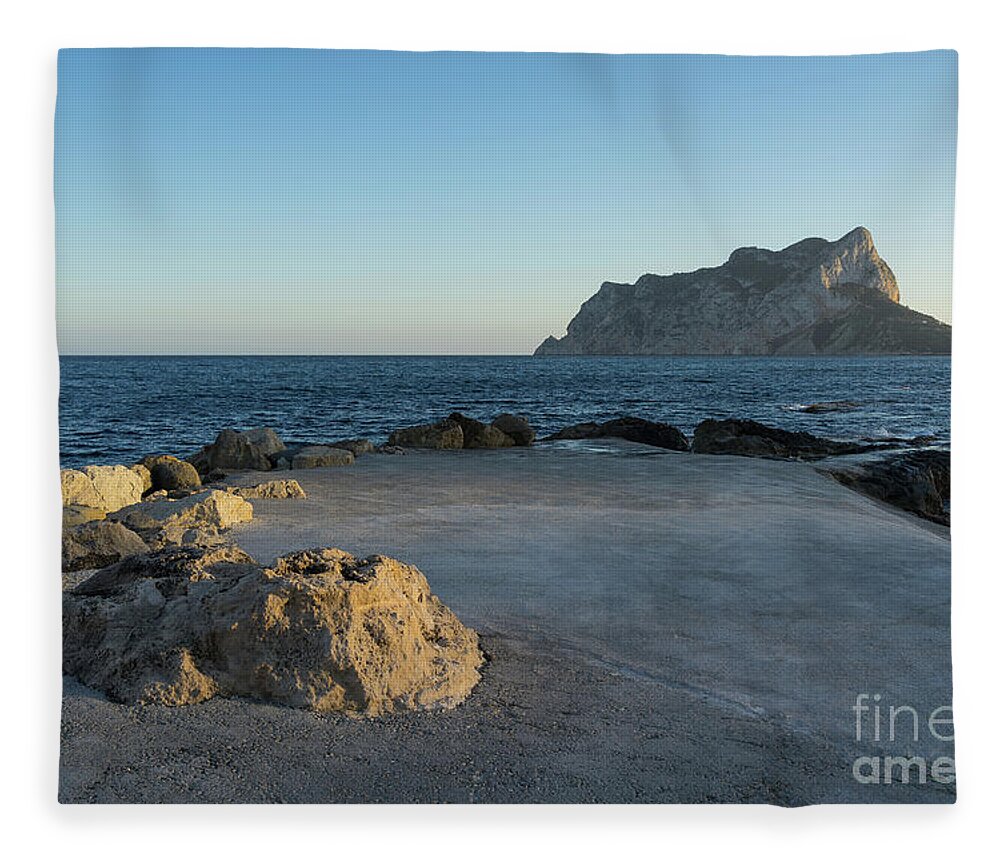 Mediterranean Coast Fleece Blanket featuring the photograph Warm evening light meets deep blue by Adriana Mueller