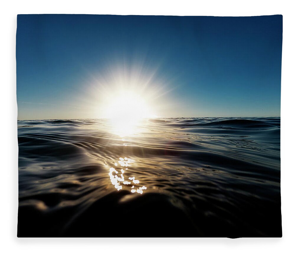 Surf Fleece Blanket featuring the photograph Water and Sky Sunset 2 by Pelo Blanco Photo