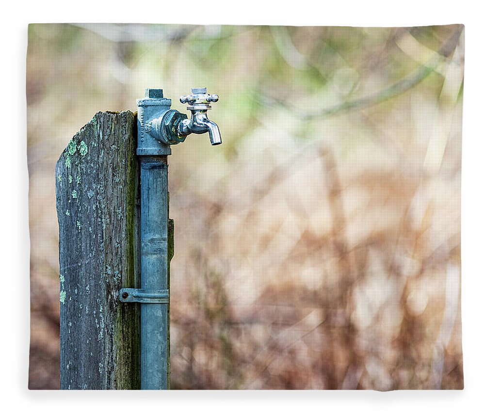 Water Fountain Fleece Blanket featuring the photograph Autumn Water Spigot #1 by Amelia Pearn