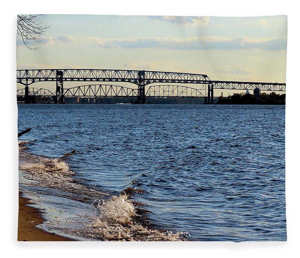 River Fleece Blanket featuring the photograph Waves Lapping the Shore of the Delaware River Near Betsy Ross and Delair Memorial Railroad Bridges by Linda Stern