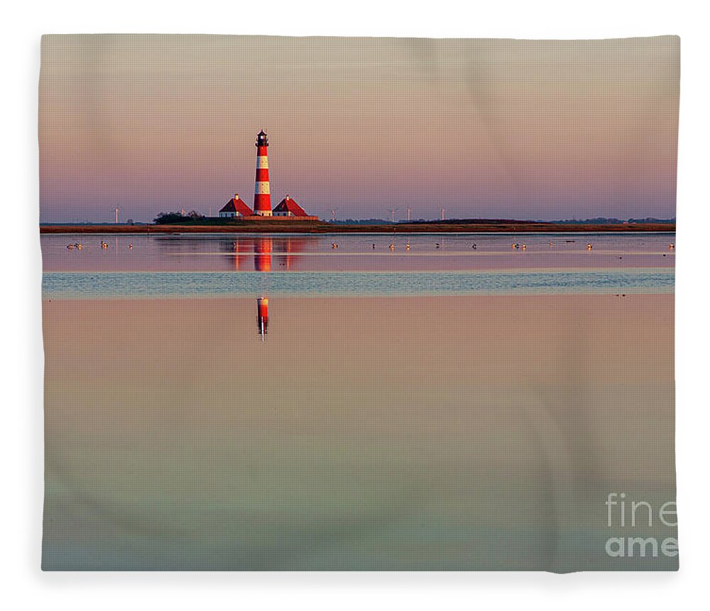 Lighthouse Fleece Blanket featuring the photograph Westerhever Lighthouse by Heiko Koehrer-Wagner