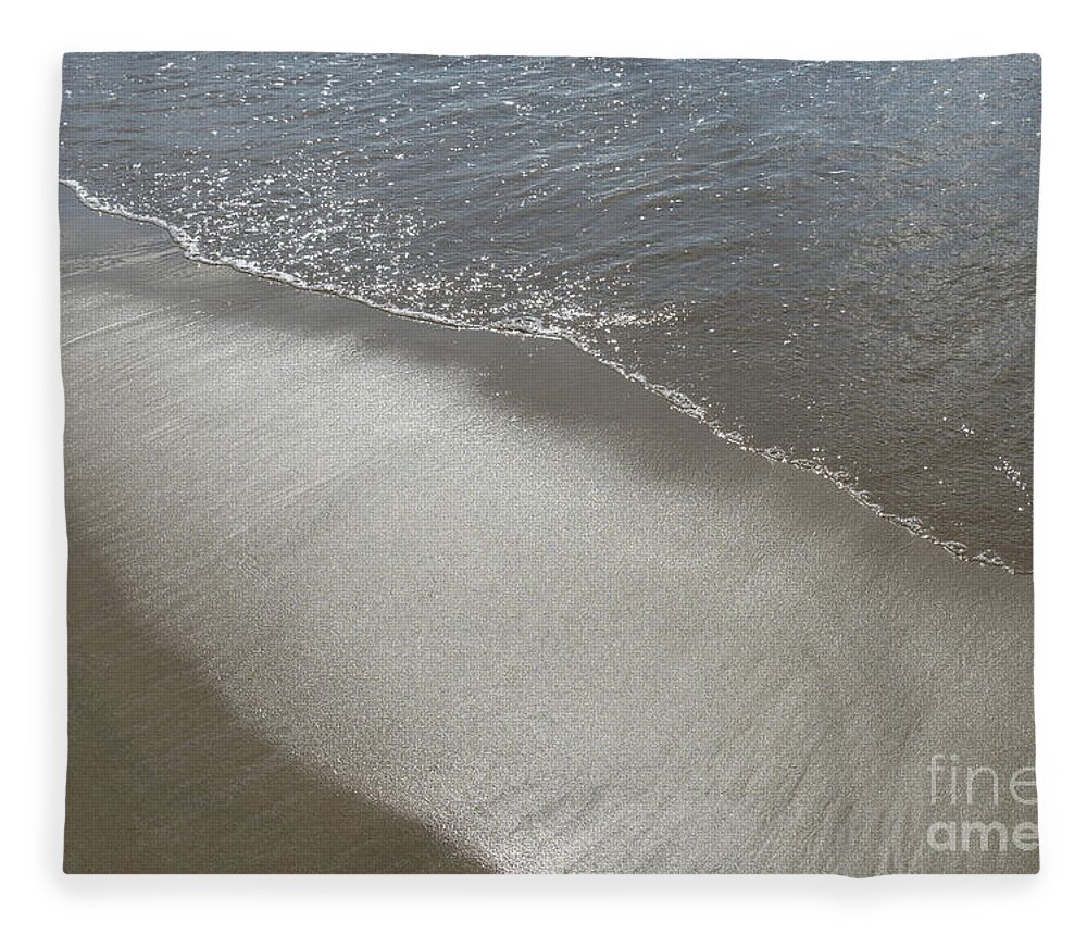 Sandy Beach Fleece Blanket featuring the photograph Wet sand, sea water and reflections of sunlight 2 by Adriana Mueller