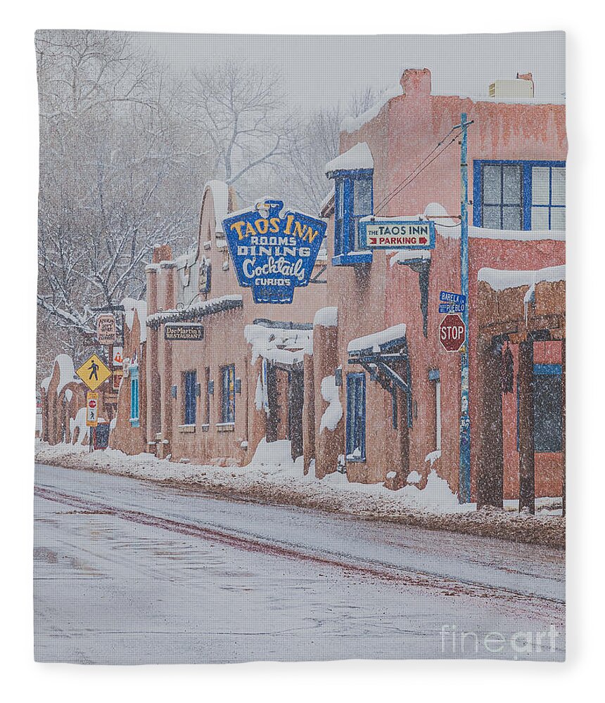 Taos Fleece Blanket featuring the photograph Winter Scene Downtown Taos by Elijah Rael